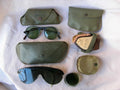 WWII – Lot de 4 Paires de Lunettes de Soleil Militaires Américaines avec Étuis (1944-1945)