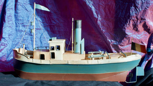 Ancien Bateau-jouet en tôle peinte années 1950