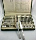 Coffret de 24 couteaux argent fourré modèle Rubans Minerve