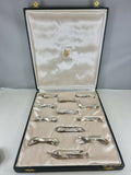 Ensemble de 12 porte-couteaux Christofle Gallia en métal argenté